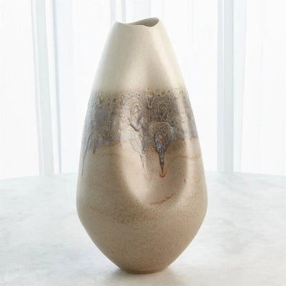 Cream Rises Dented Vase by Global Views in cream and ivory. Made from unique in a modern style.