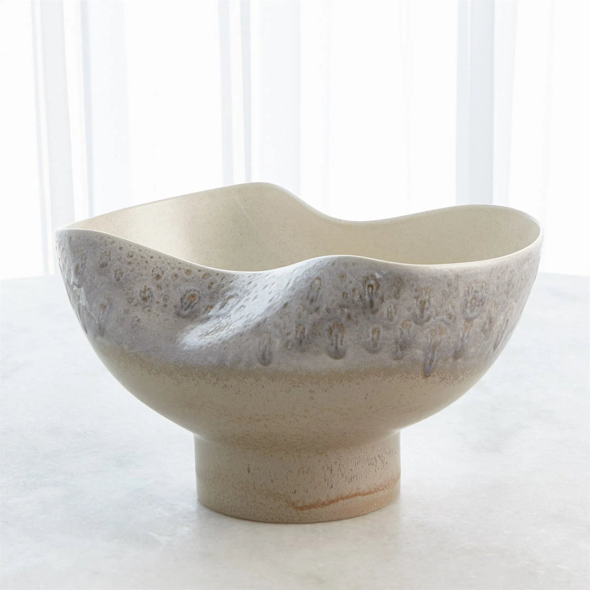 Cream Rises Dented Vase by Global Views in cream and ivory. Made from unique in a modern style.