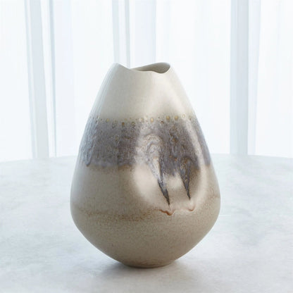 Cream Rises Dented Vase by Global Views in cream and ivory. Made from unique in a modern style.