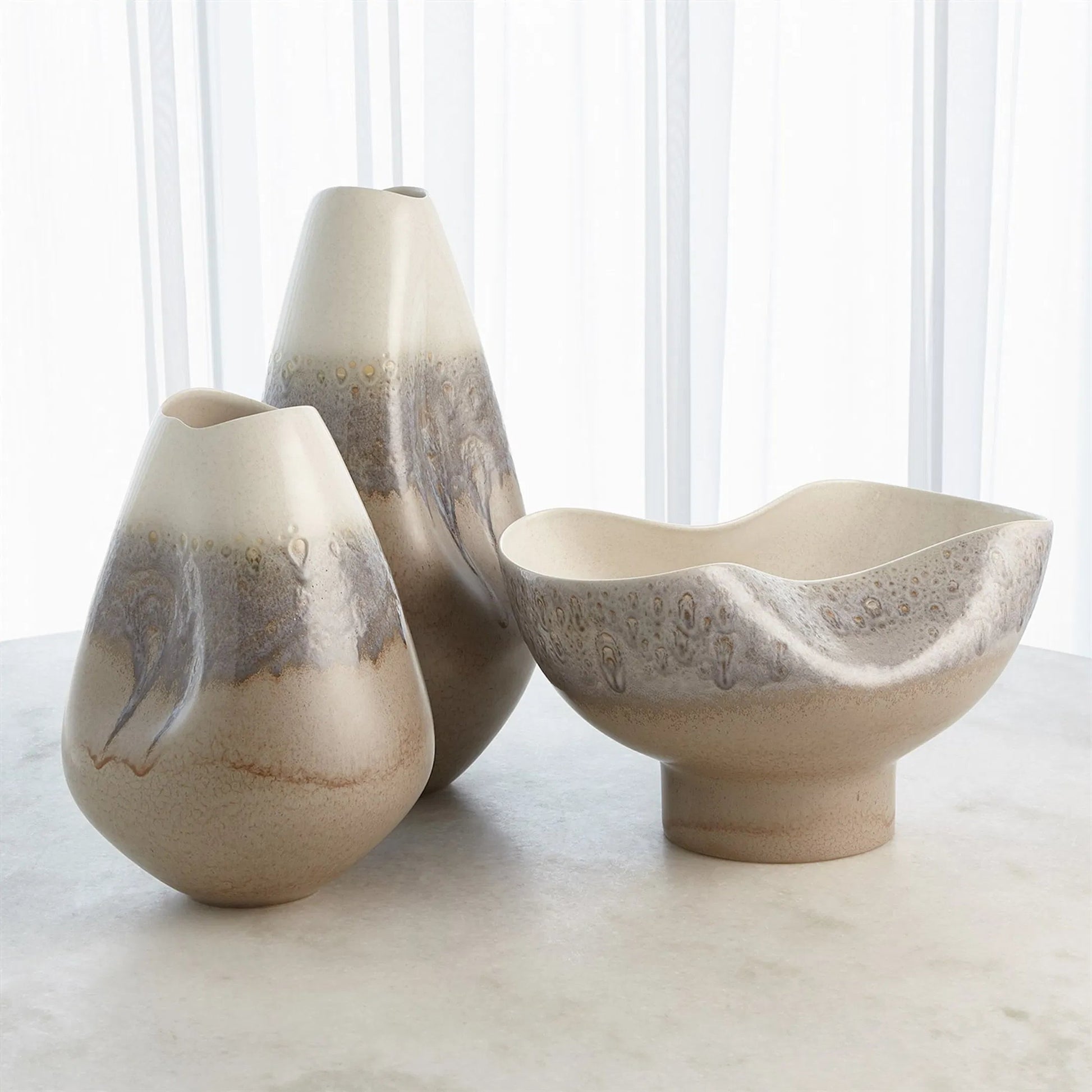 Cream Rises Dented Vase by Global Views in cream and ivory. Made from unique in a modern style.