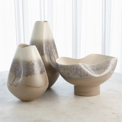 Cream Rises Dented Vase by Global Views in cream and ivory. Made from unique in a modern style.