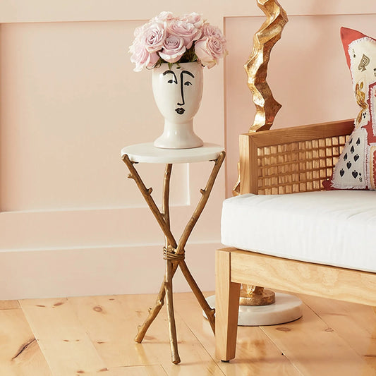 Thorn Table by Global Views in brass. Made from brass, marble in a transitional style.