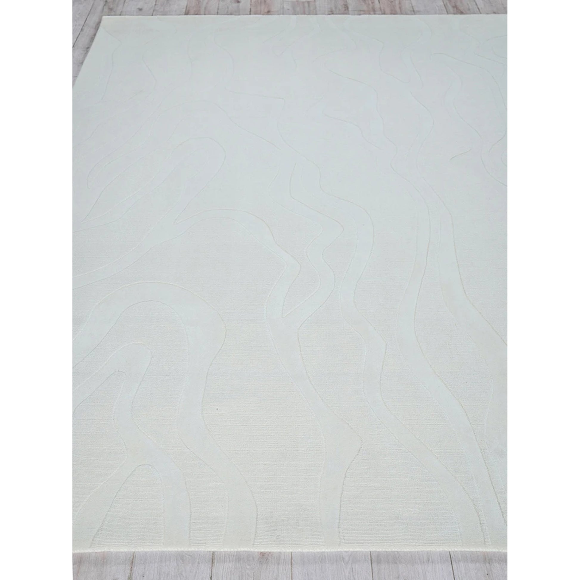 Tempo Area Rug by Exquisite Rugs in ivory. Made from new zealand wool in a unique style.