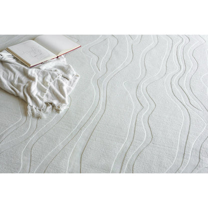 Tempo Area Rug by Exquisite Rugs in ivory. Made from new zealand wool in a unique style.