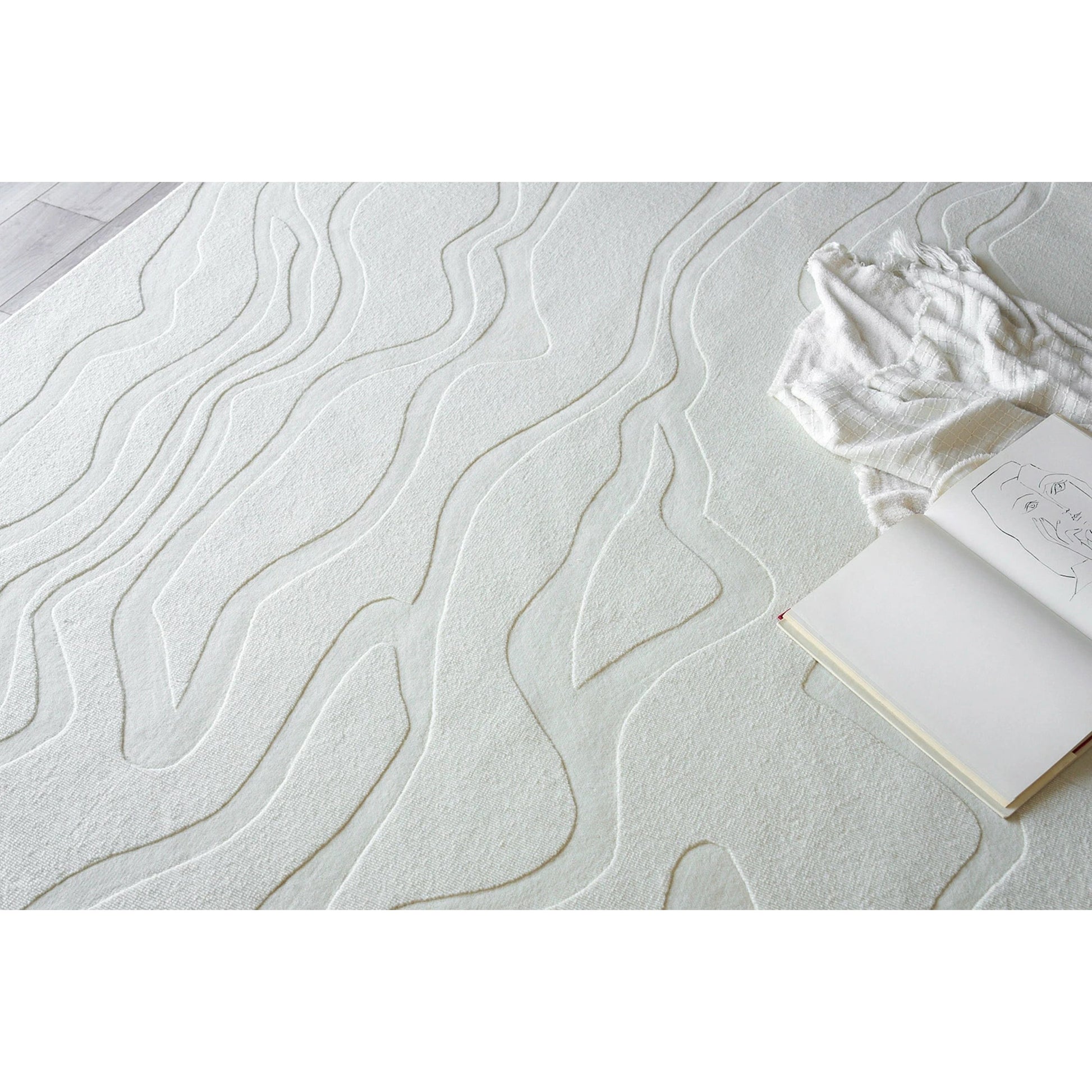 Tempo Area Rug by Exquisite Rugs in ivory. Made from new zealand wool in a unique style.