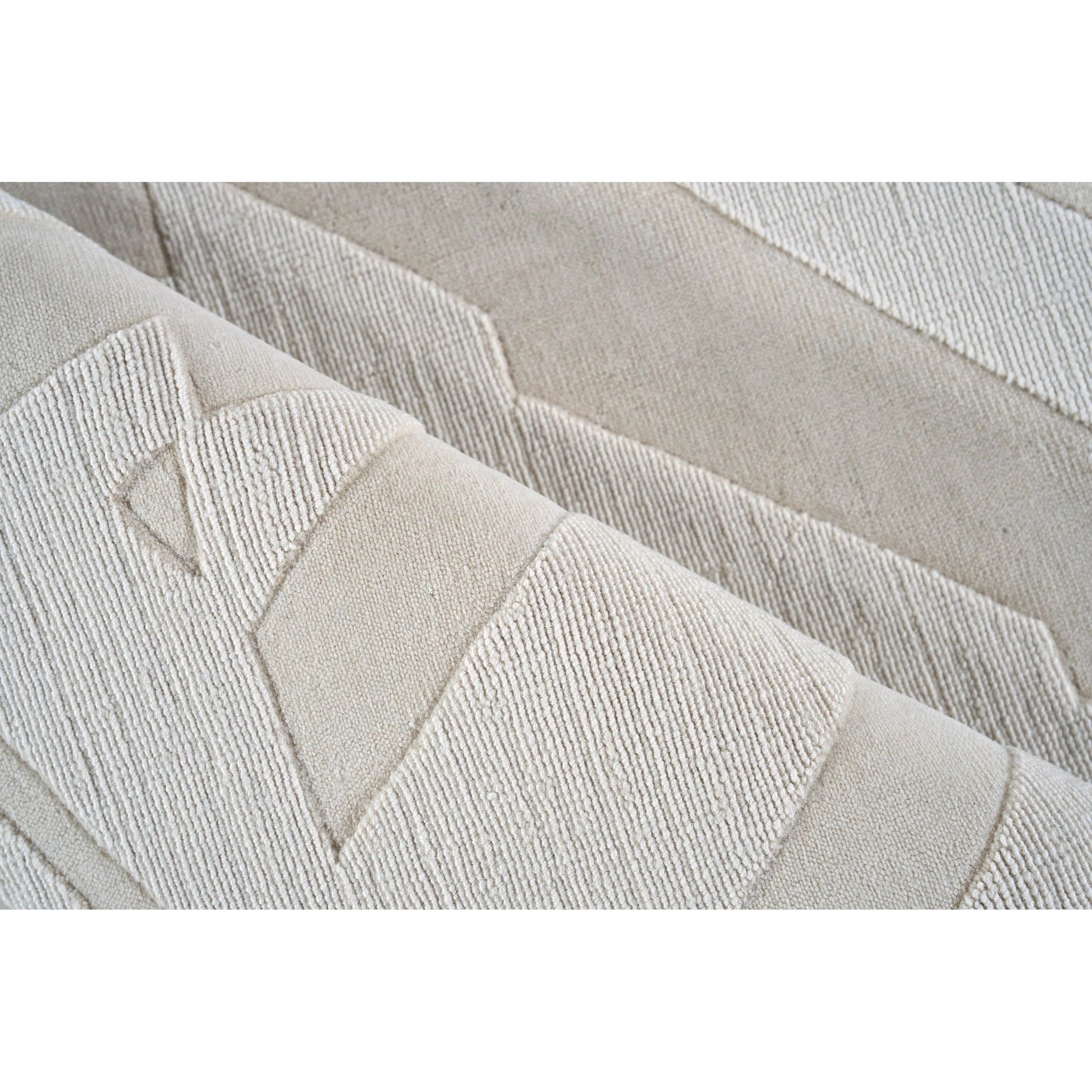 Tempo Pattern Rug by Exquisite Rugs in light beige. Made from new zealand wool in a unique style.