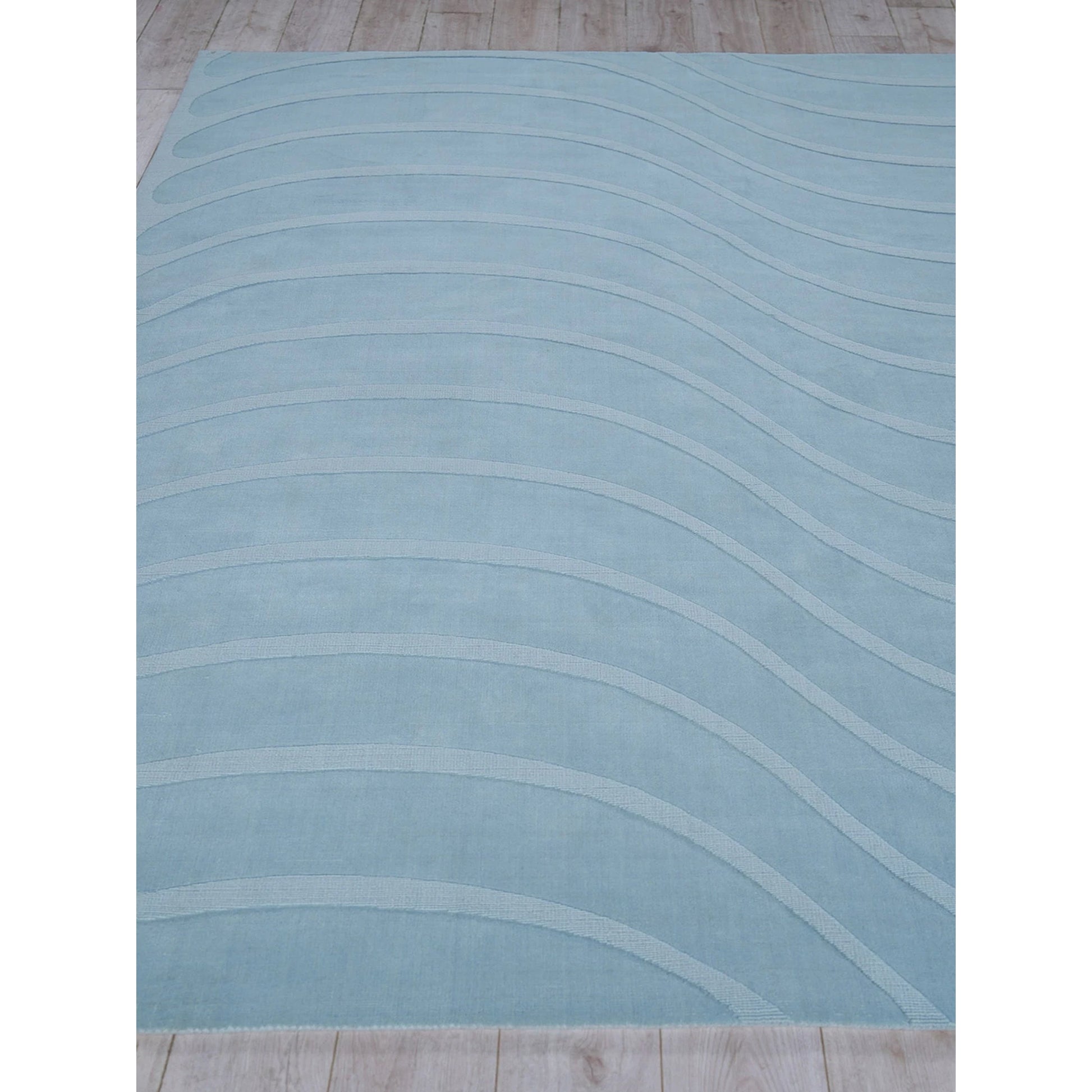 Tempo 6234 Rug by Exquisite Rugs in light blue. Made from new zealand wool in a unique style.