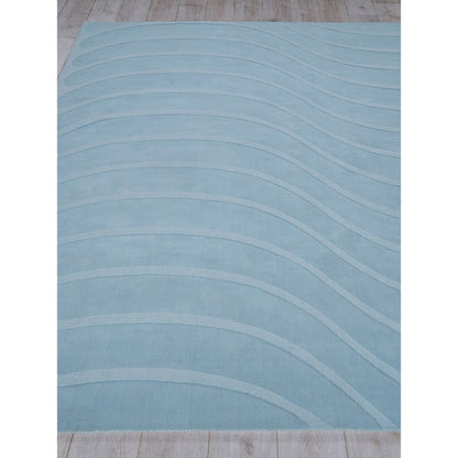Tempo 6234 Rug by Exquisite Rugs in light blue. Made from new zealand wool in a unique style.