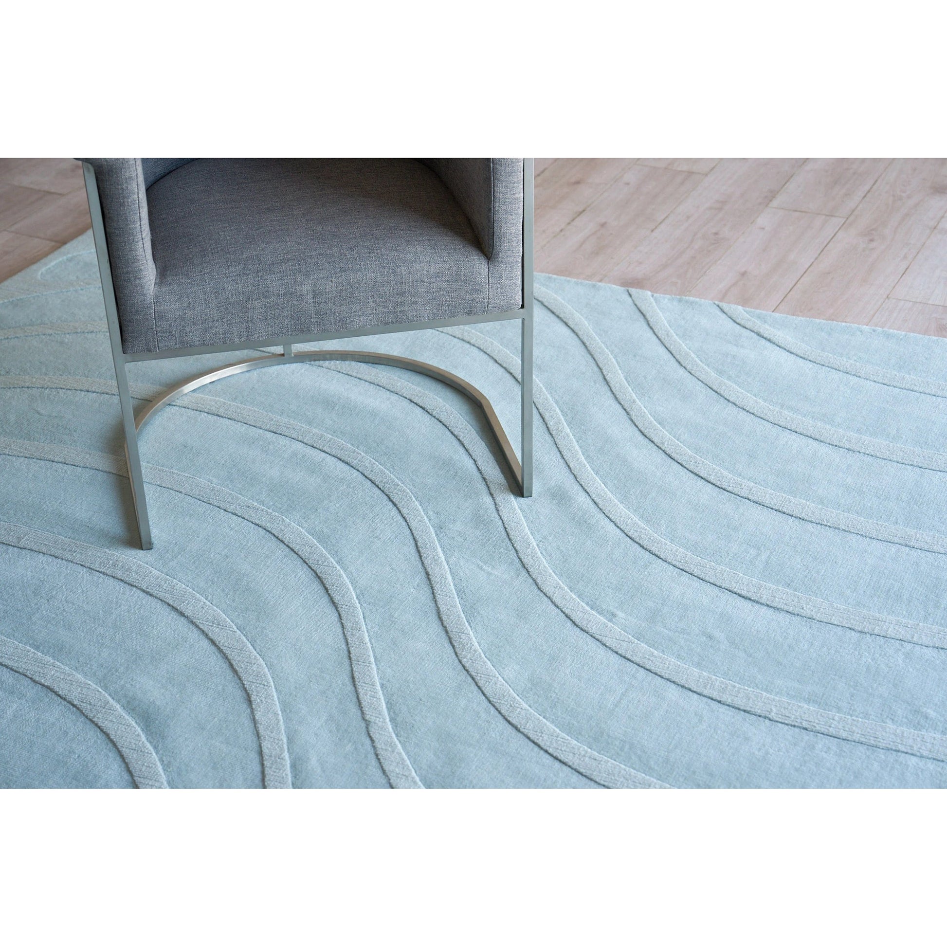 Tempo 6234 Rug by Exquisite Rugs in light blue. Made from new zealand wool in a unique style.