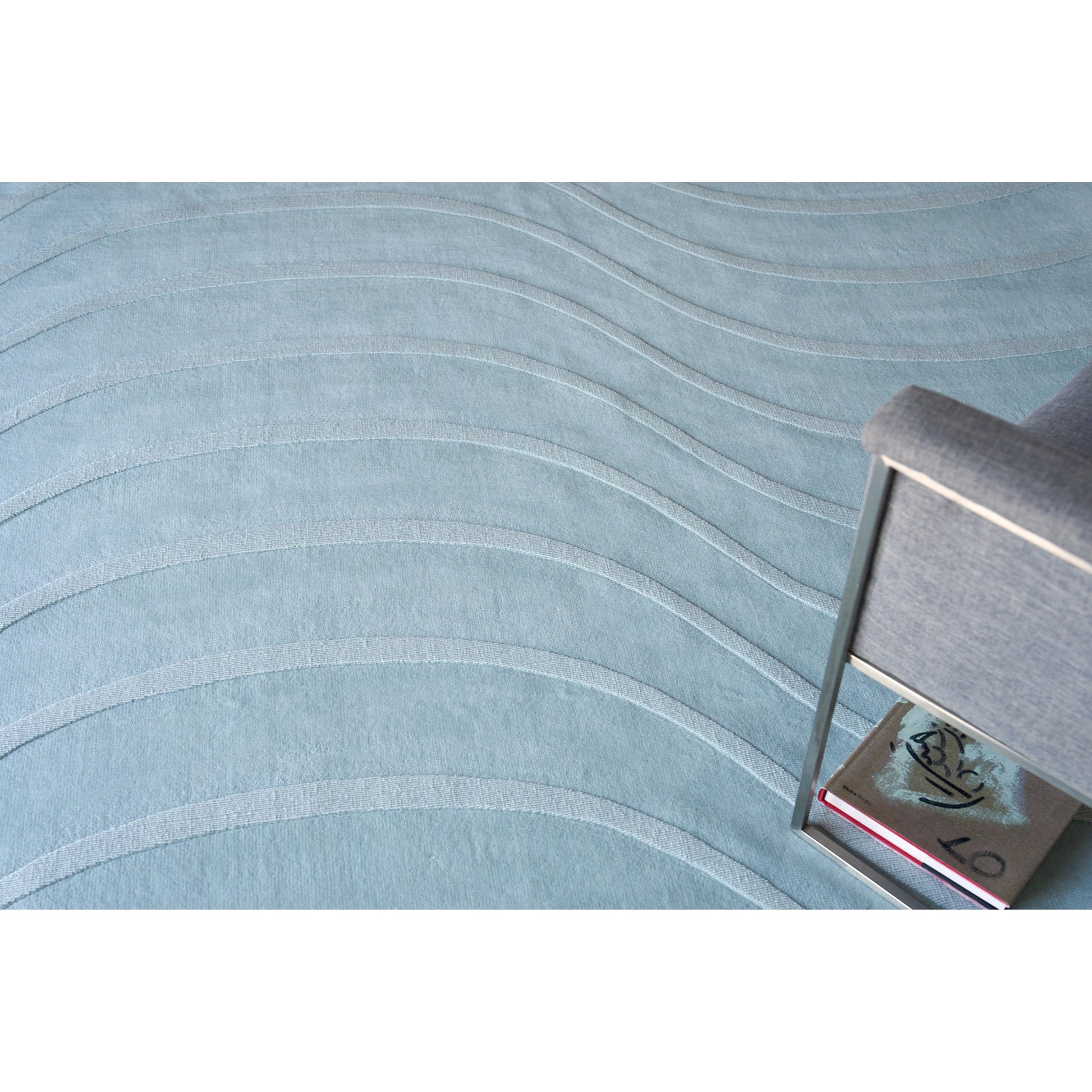 Tempo 6234 Rug by Exquisite Rugs in light blue. Made from new zealand wool in a unique style.