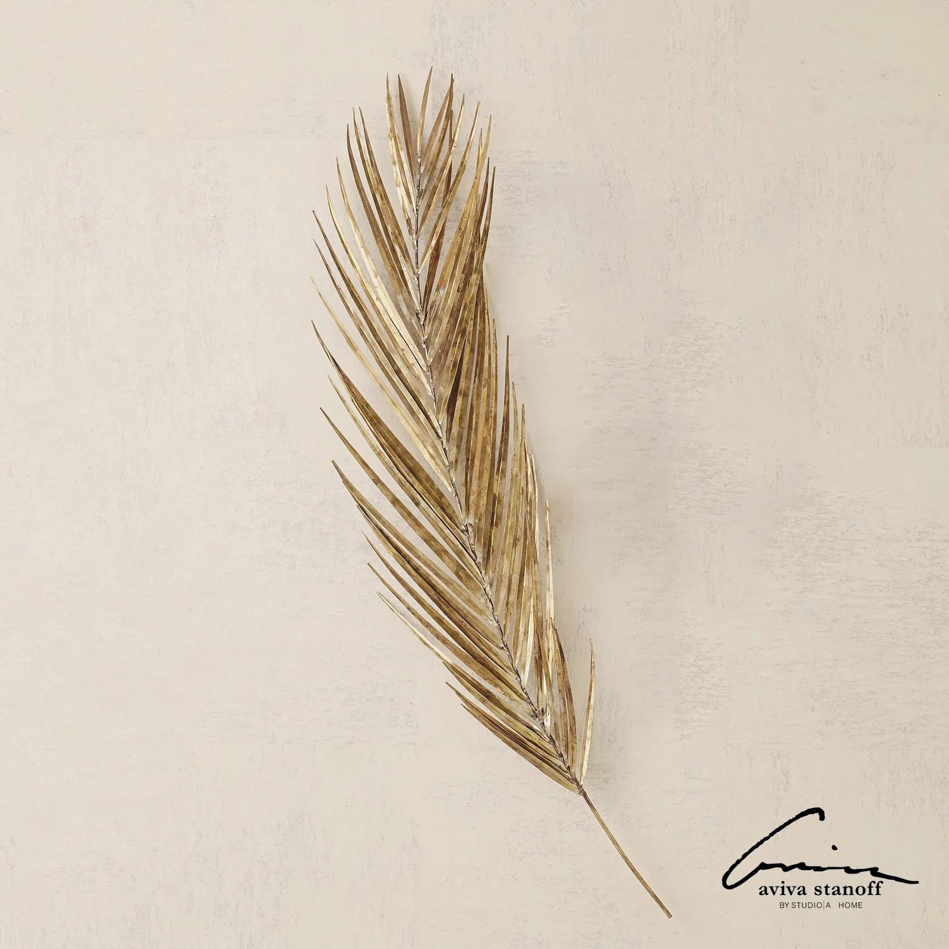 Palm Leaf by Global Views in antique brass. Made from brass, metal pipe in a modern style.