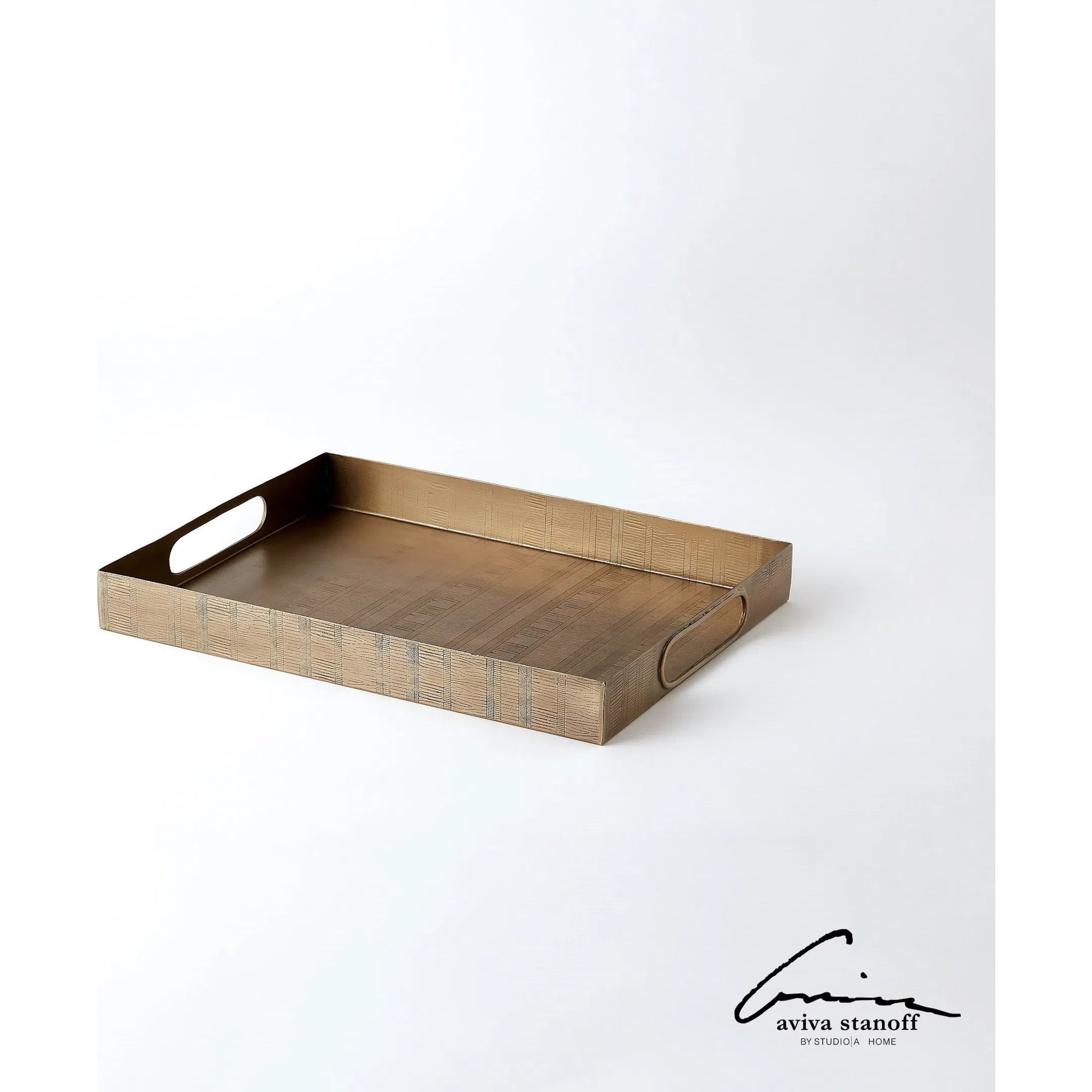 Kokoro Etched Rectangle Tray by Global Views in brass. Made from iron in a eclectic & global style.