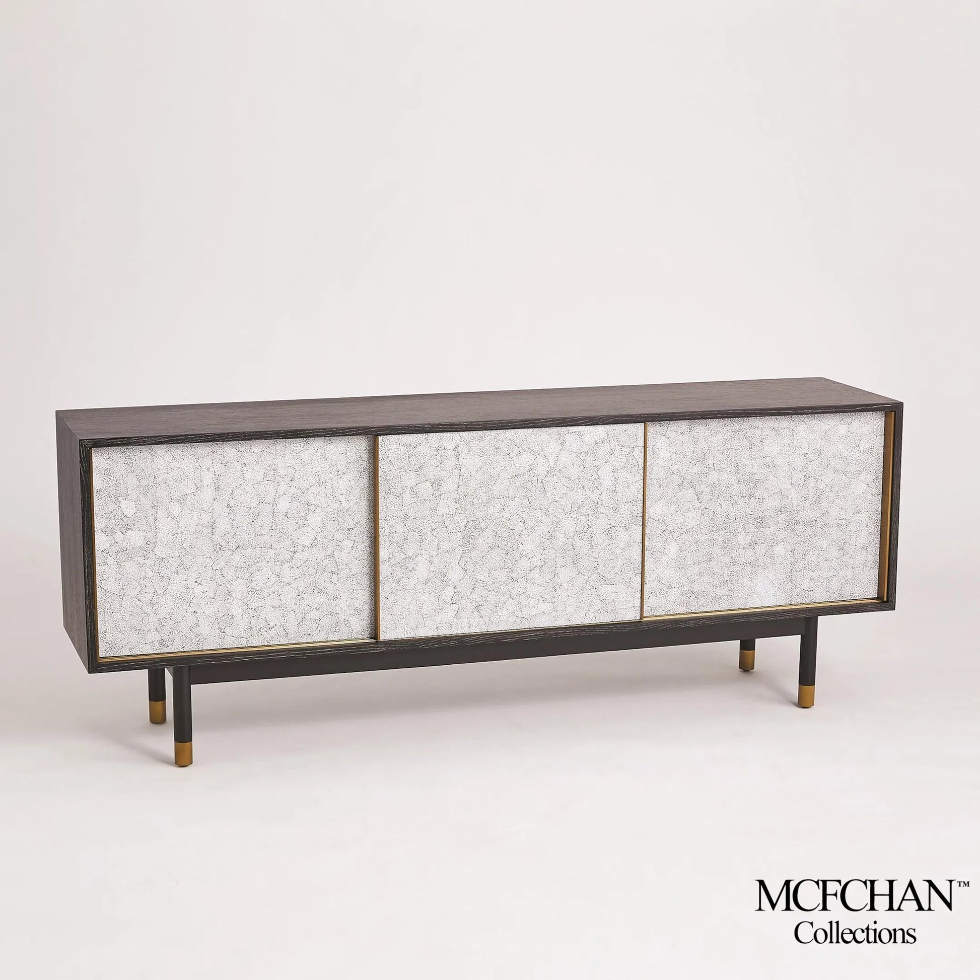 Ostara Media Cabinet by Global Views in acacia, oak. Made from beech, mdf, brass sabots, egg shell in a modern style.