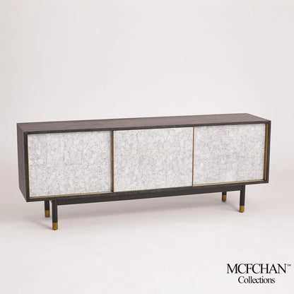 Ostara Media Cabinet by Global Views in acacia, oak. Made from beech, mdf, brass sabots, egg shell in a modern style.