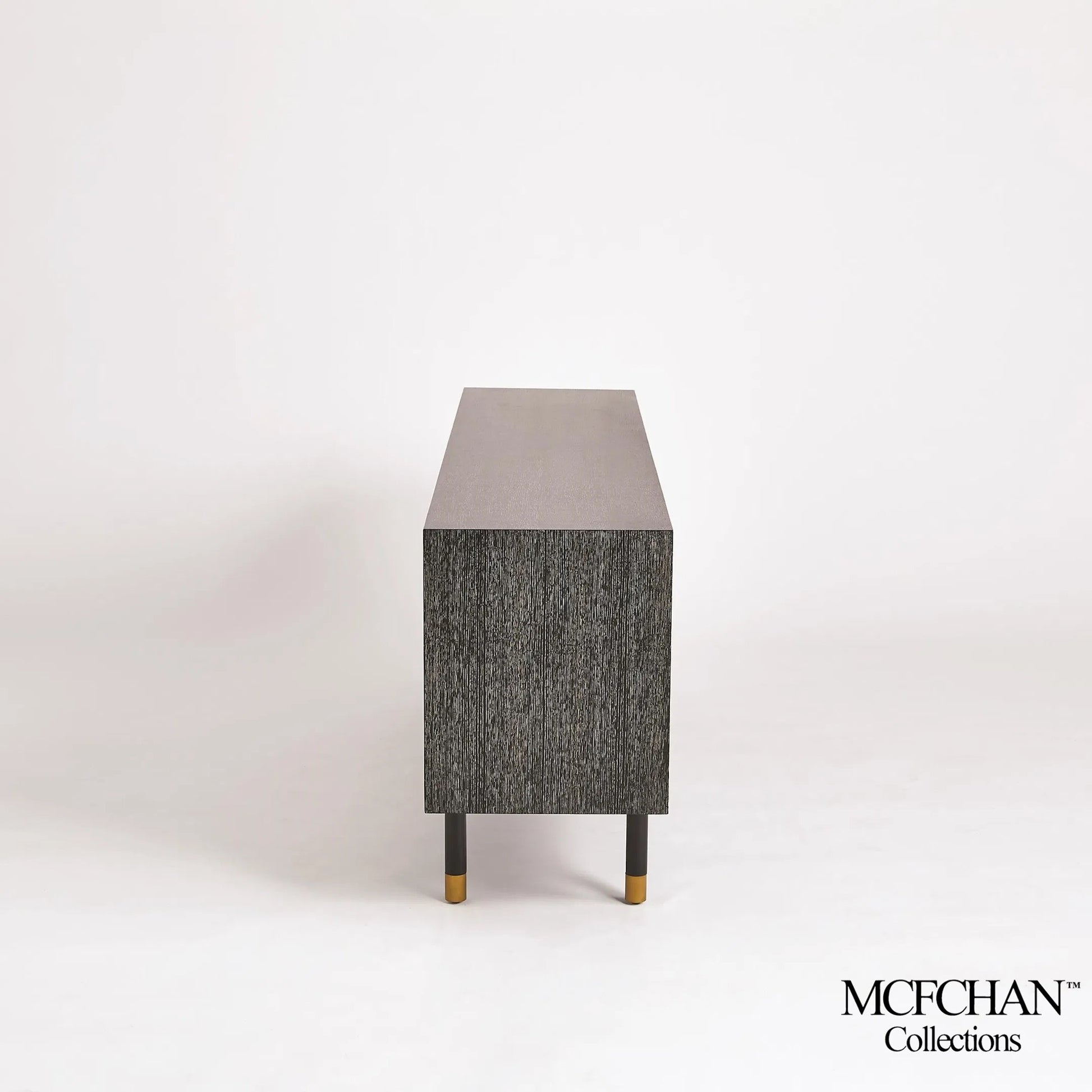 Ostara Media Cabinet by Global Views in acacia, oak. Made from beech, mdf, brass sabots, egg shell in a modern style.