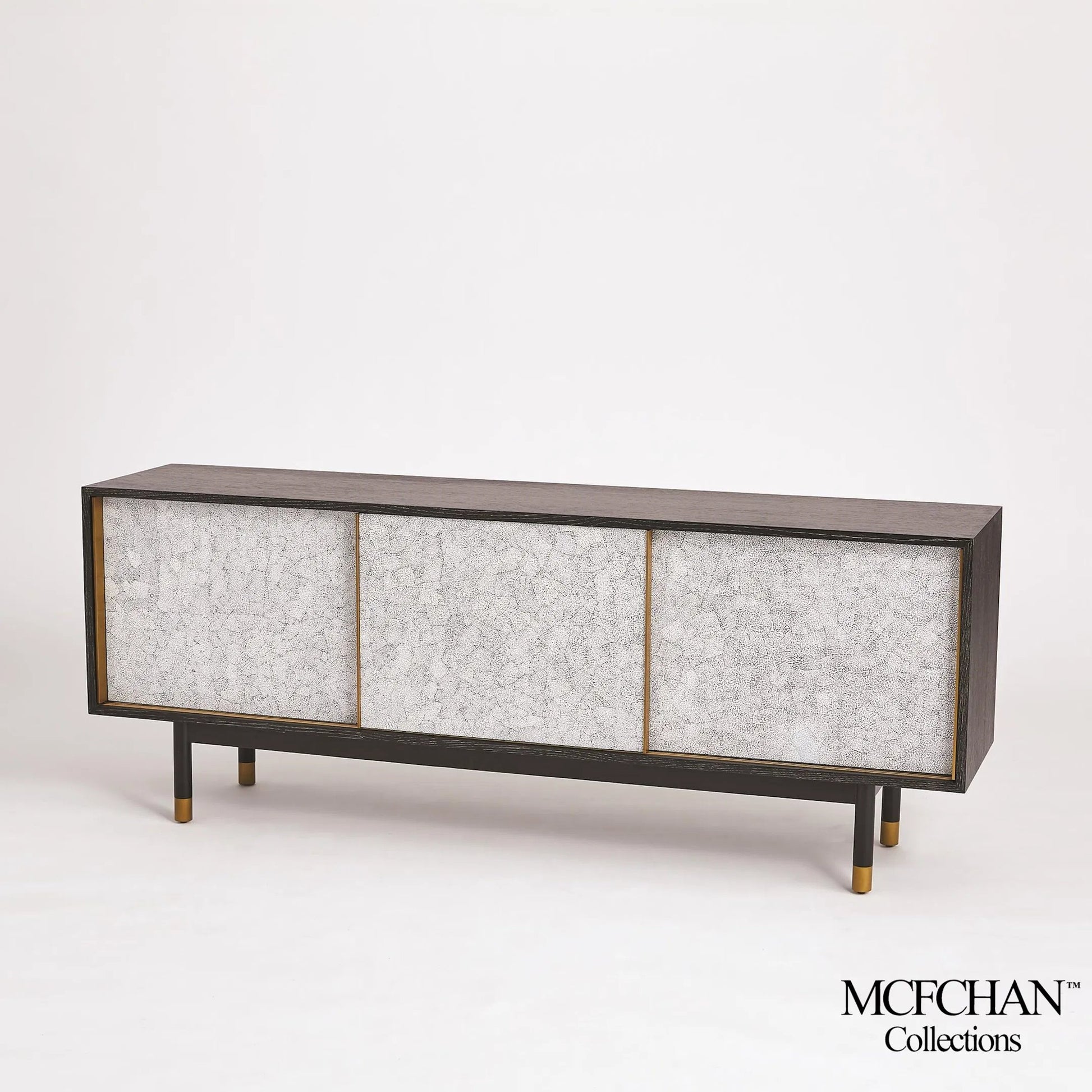 Ostara Media Cabinet by Global Views in acacia, oak. Made from beech, mdf, brass sabots, egg shell in a modern style.