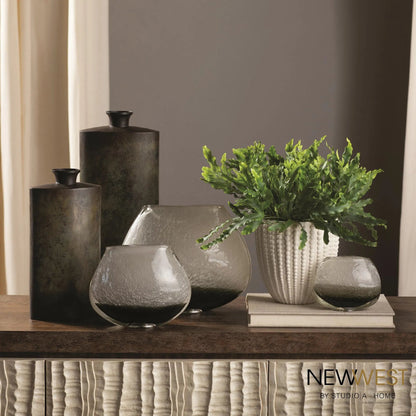 Nail Head Bowl by Global Views in rustic white. Made from ceramic in a coastal style.