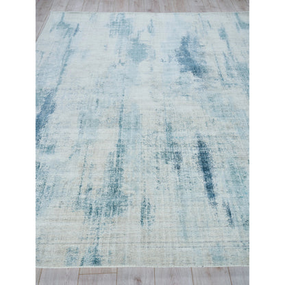 Stone Wash Gazni Rug by Exquisite Rugs in blue. Made from wool, bamboo silk in a unique style.