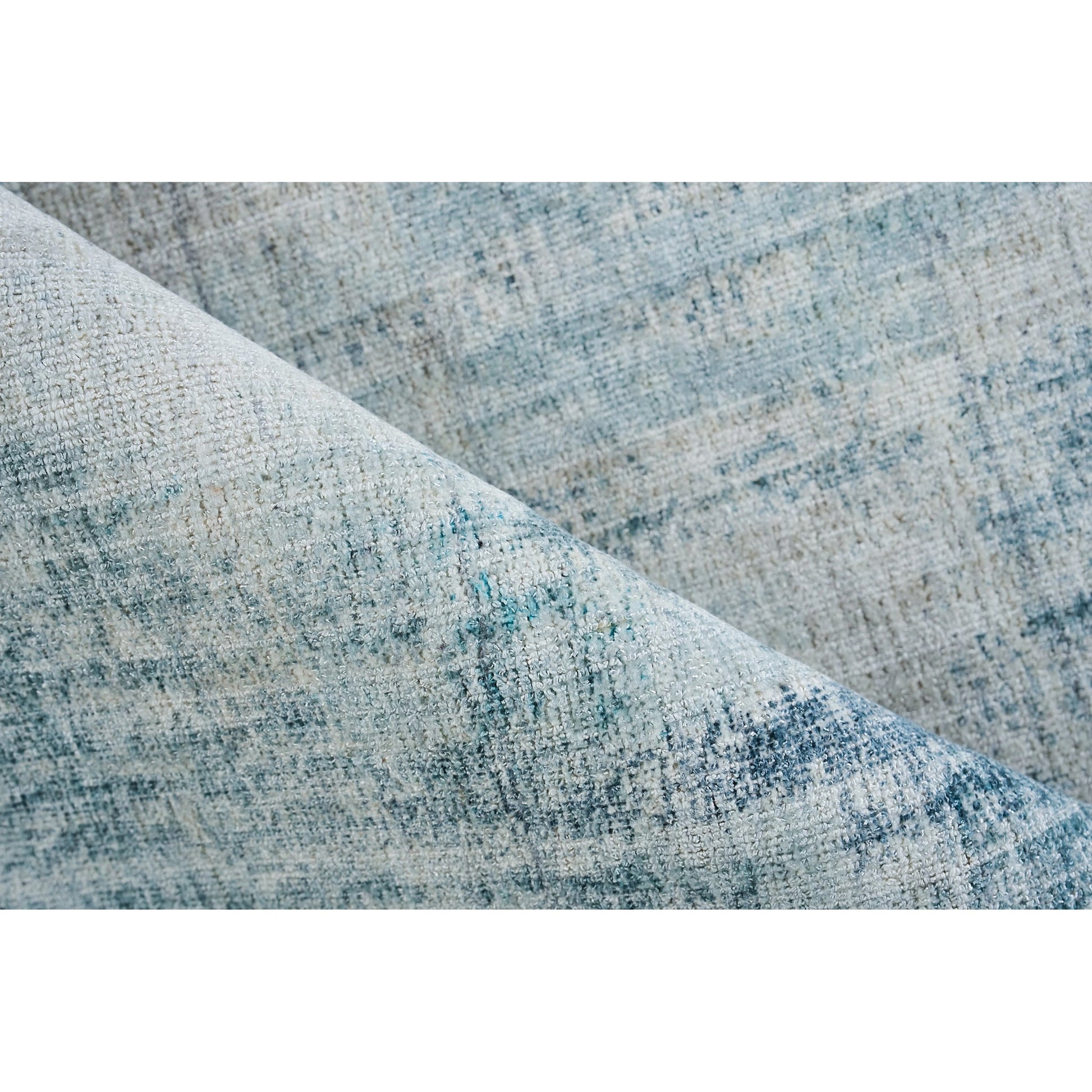 Stone Wash Gazni Rug by Exquisite Rugs in blue. Made from wool, bamboo silk in a unique style.