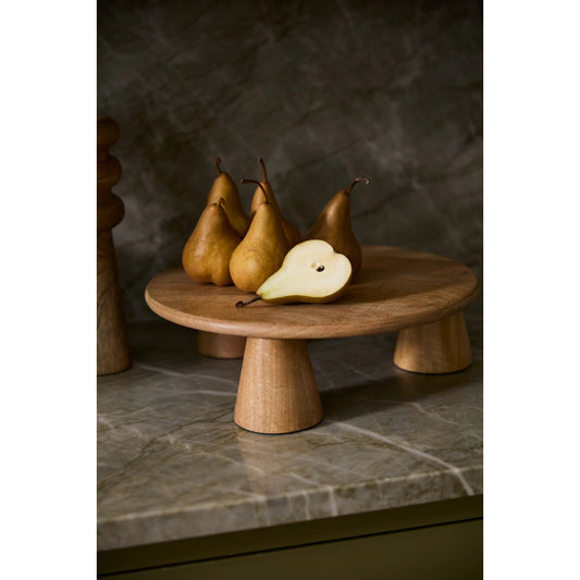 Atticus Stand by Accent Decor in natural. Made from wood in a unique style.