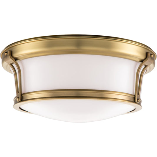Newport Flush Mount by Hudson Valley in aged brass. Made from steel in a modern style.