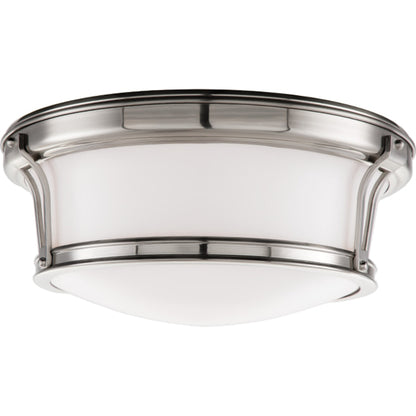 Newport Flush Mount by Hudson Valley in aged brass. Made from steel in a modern style.