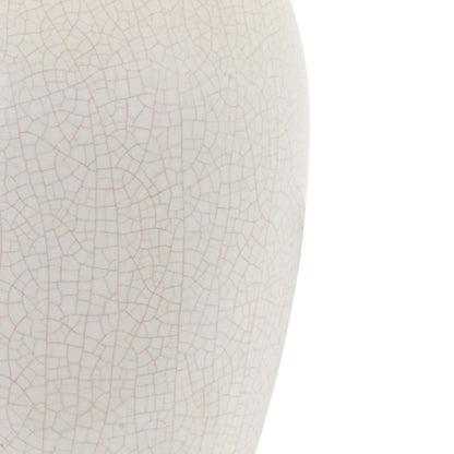 Kyoko Lamp by Wildwood in white crackle glaze, antique brass. Made from ceramic, porcelain in a transitional style.