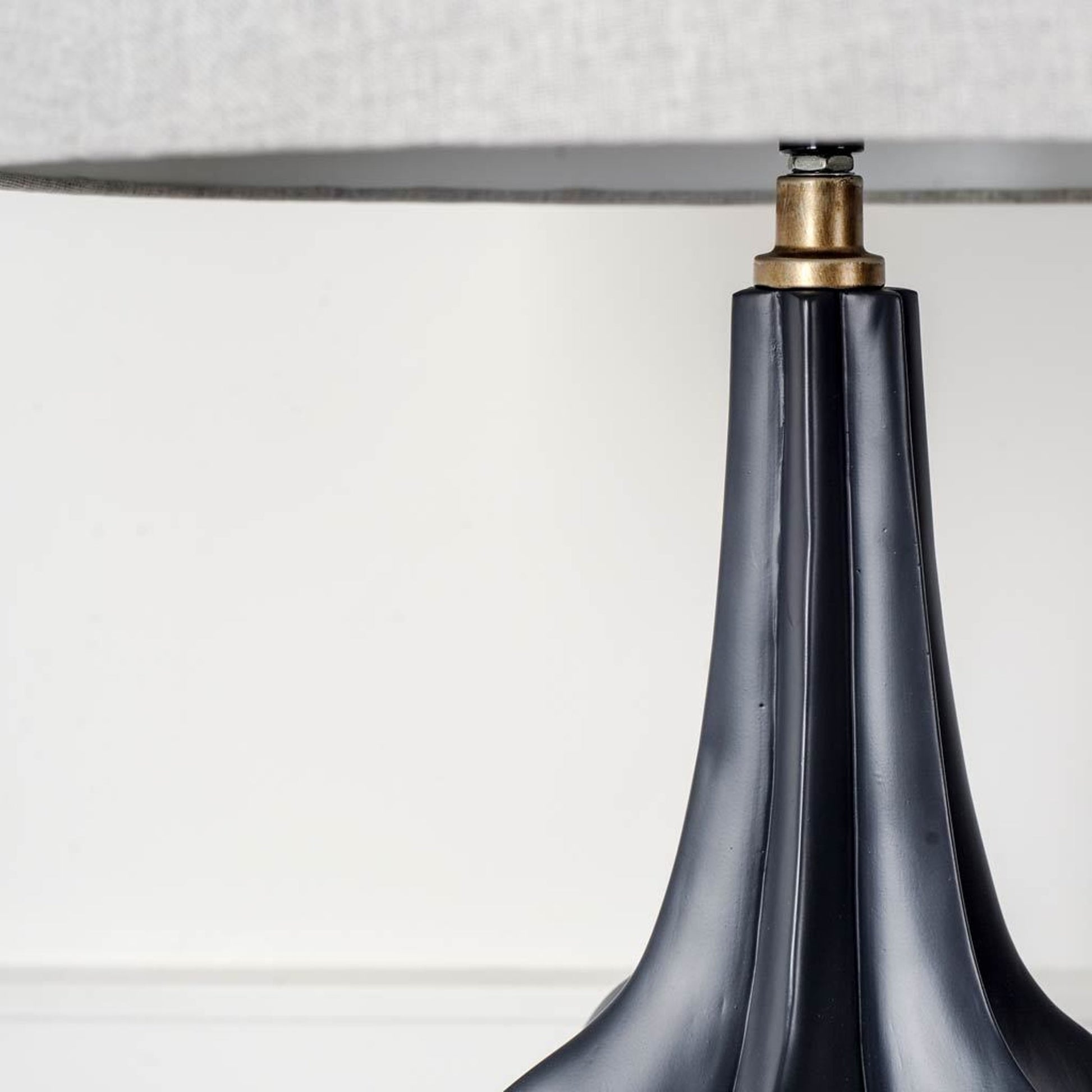 Bravar Table Lamp by Mercana in black. Made from unique in a modern style.