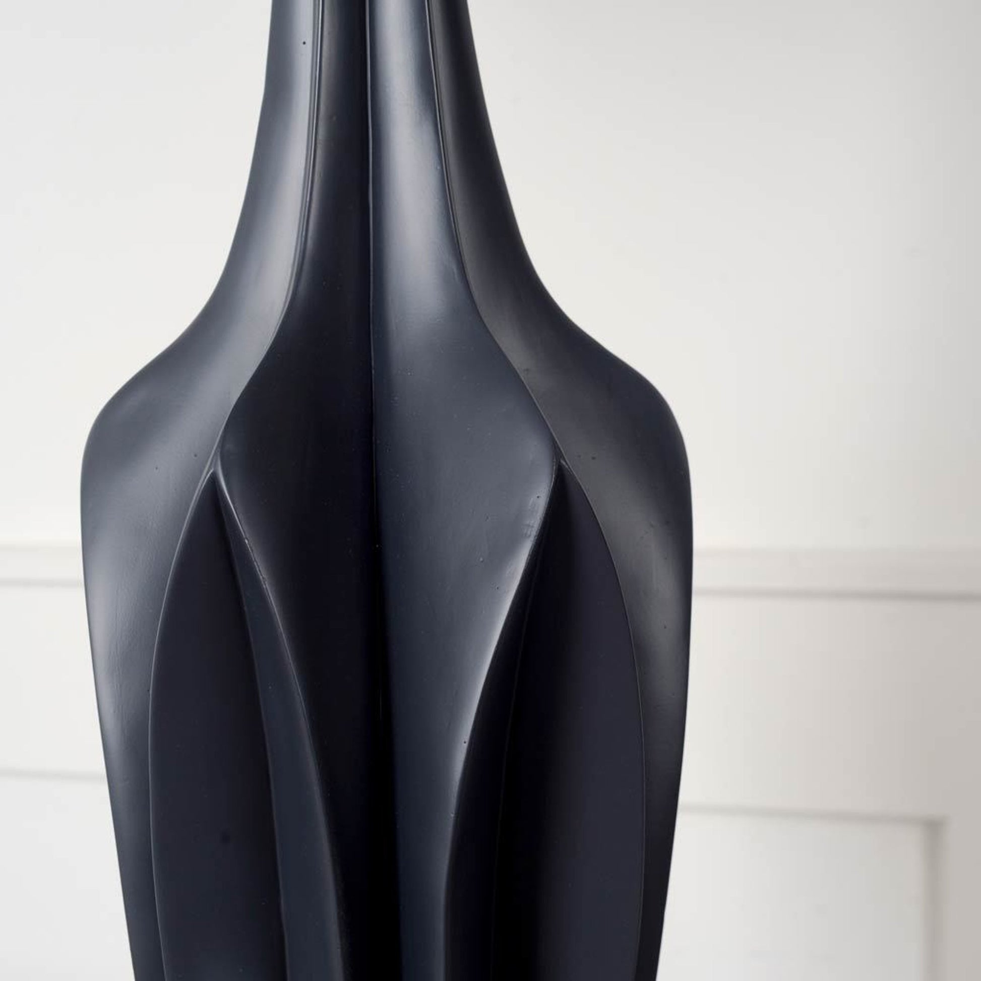 Bravar Table Lamp by Mercana in black. Made from unique in a modern style.