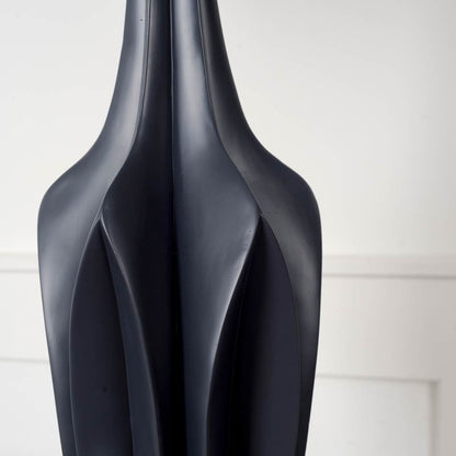 Bravar Table Lamp by Mercana in black. Made from unique in a modern style.