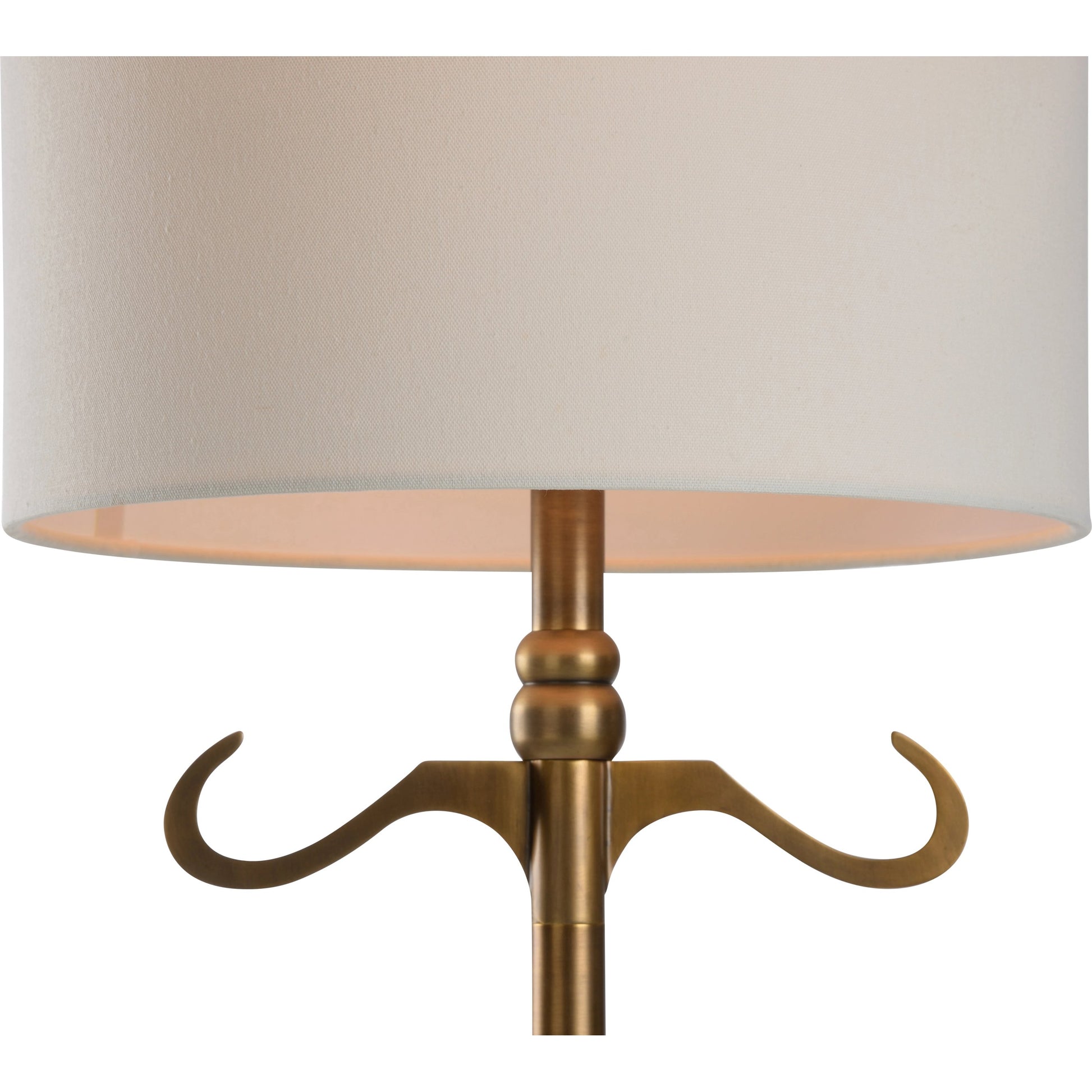 Lumiere Floor Lamp by Wildwood in antique brass. Made from iron in a modern style.