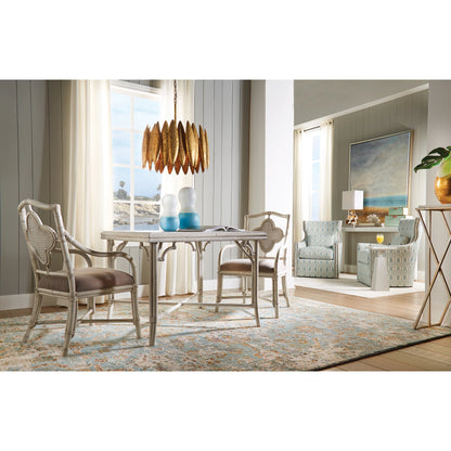 Ryland Chandelier by Wildwood in antique gold leaf. Made from iron in a modern style.