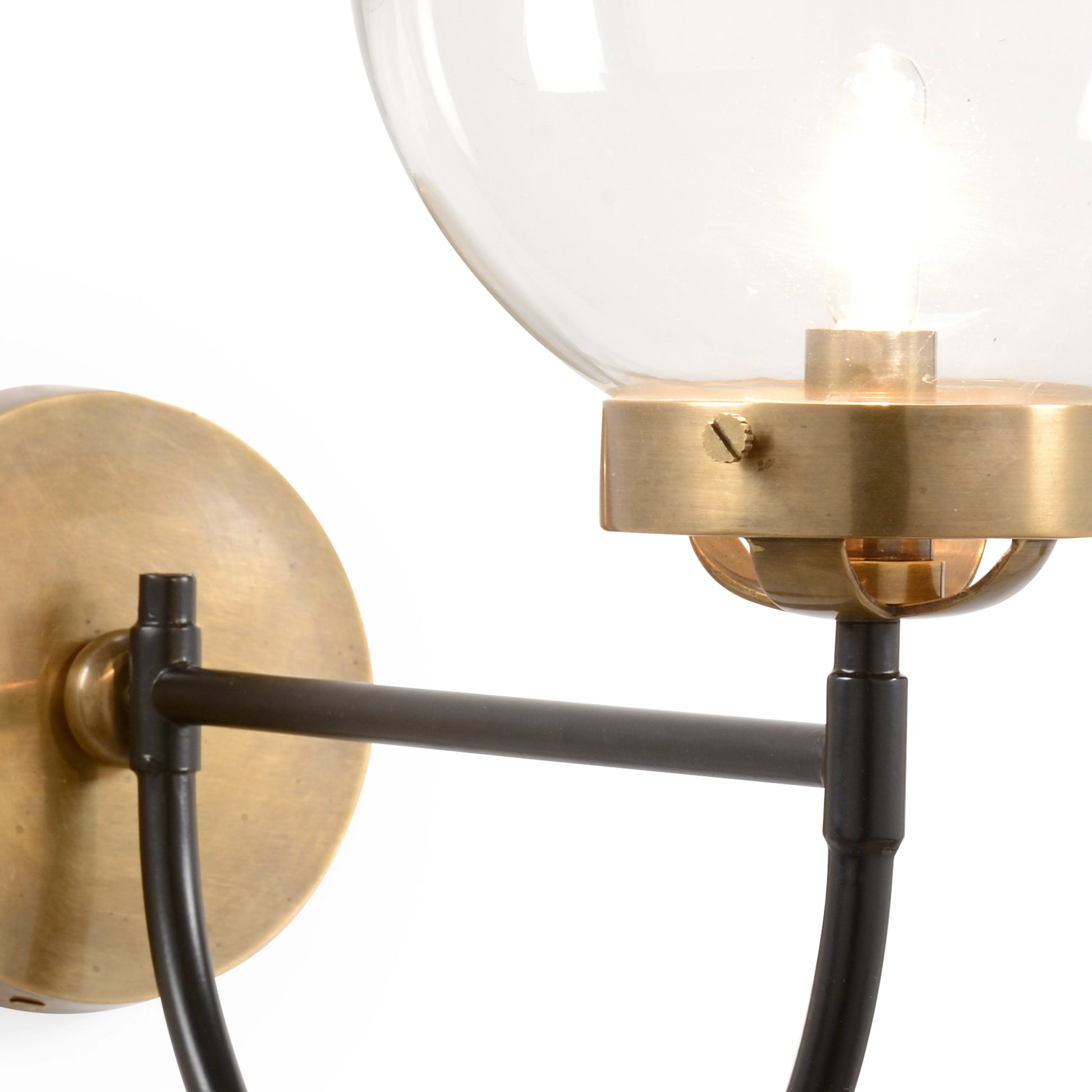 Bistro Sconce by Wildwood in antique, black, clear. Made from unique in a modern style.