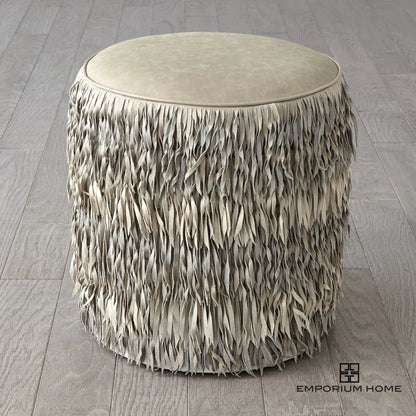 Fringe Ottoman by Global Views. Made from mdf, leather, pvc in a unique style.