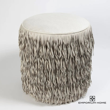 Fringe Ottoman by Global Views. Made from mdf, leather, pvc in a unique style.