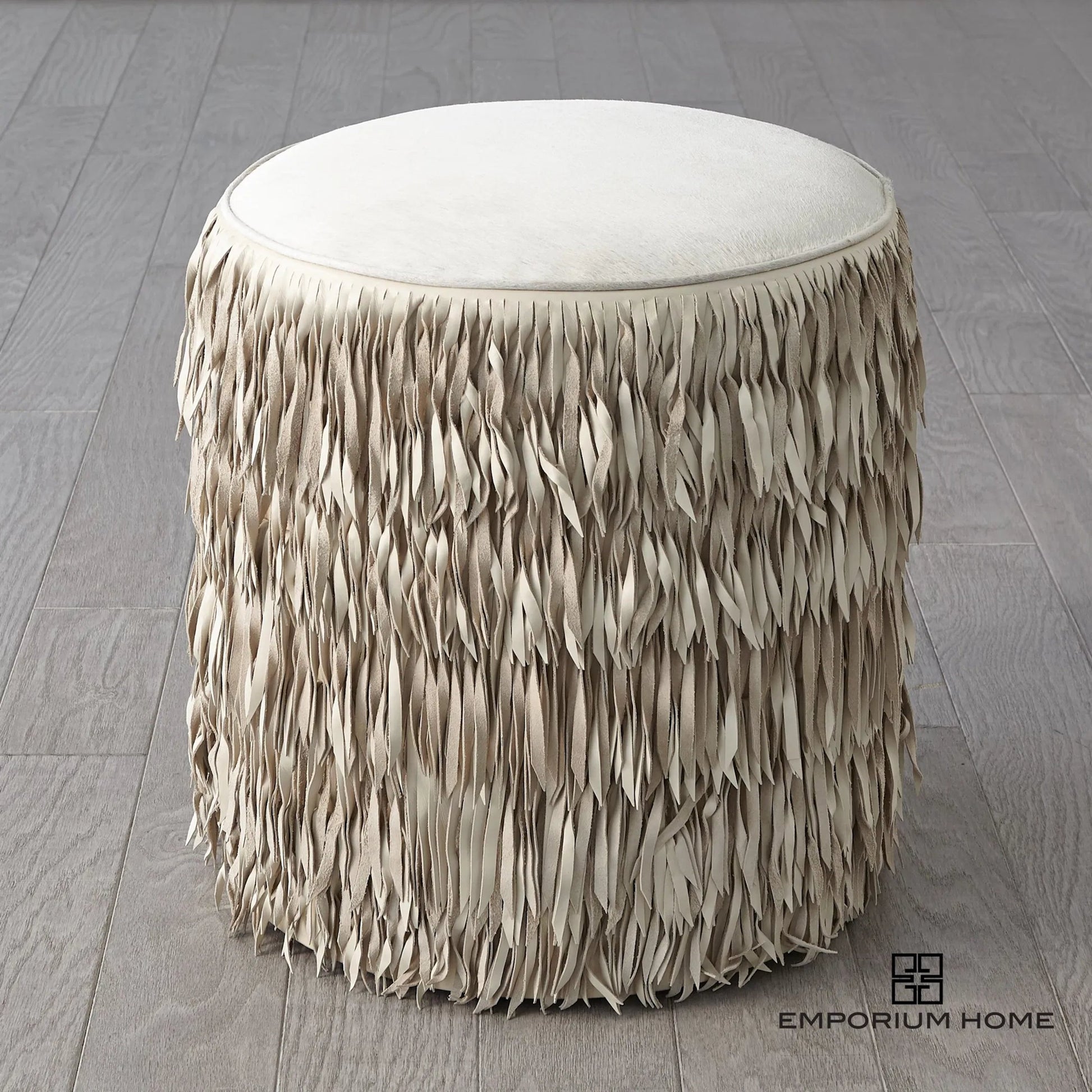 Fringe Ottoman by Global Views. Made from mdf, leather, pvc in a unique style.