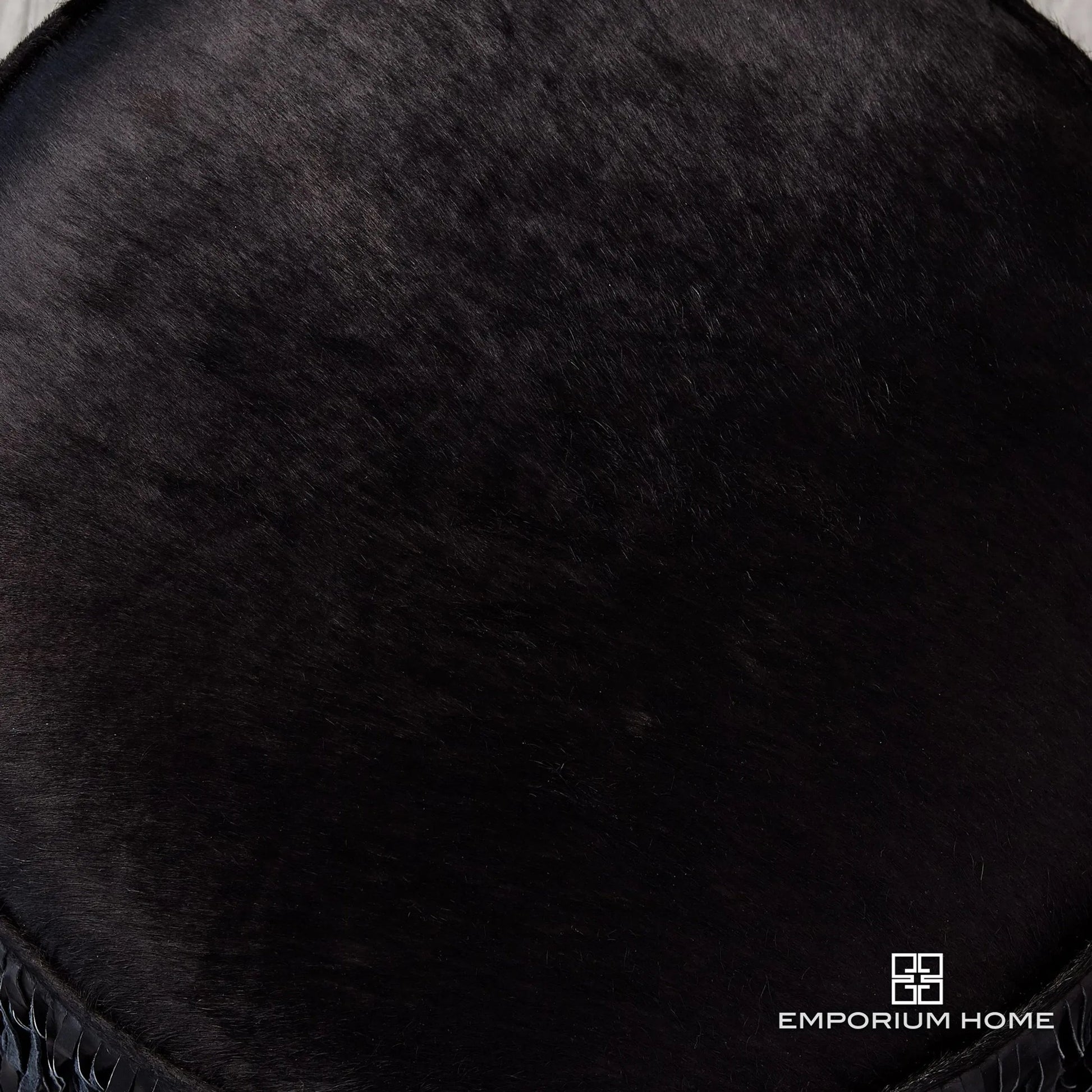 Fringe Ottoman by Global Views. Made from mdf, leather, pvc in a unique style.