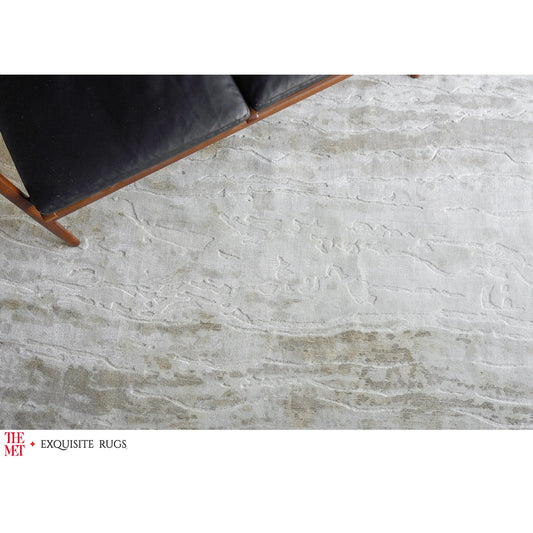 The Met X Exquisite Rugs Travertine 6805 Rug by Exquisite Rugs in beige. Made from wool, bamboo silk in a unique style.