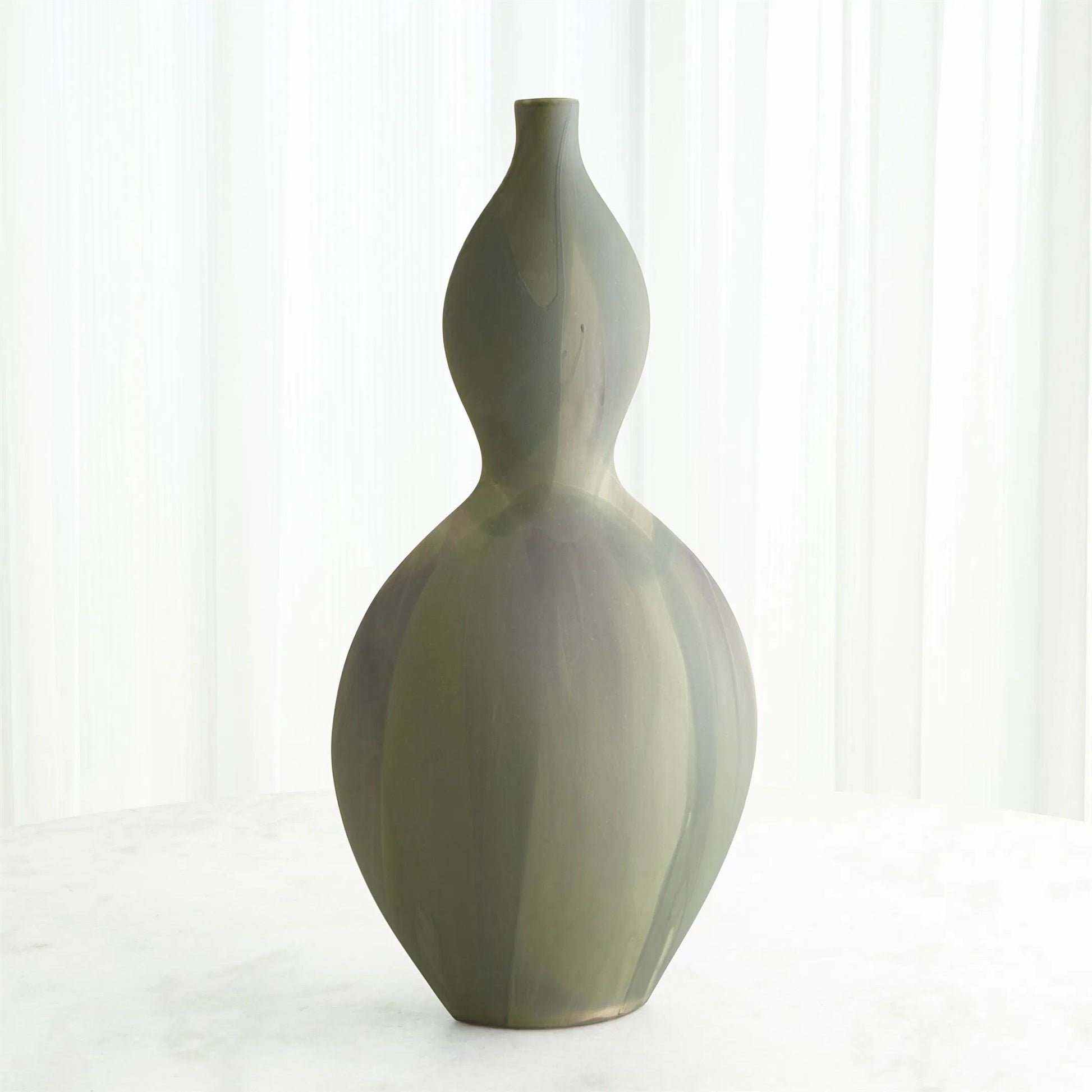 Helios Green Vase by Global Views in green. Made from unique in a unique style.