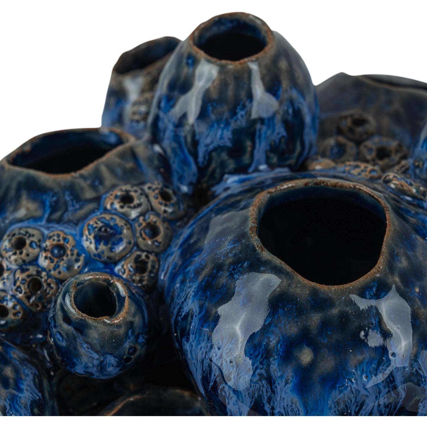 004 SI-2387159 | Closeup | Sulawasi Blue Shells by Currey and Company in reactive dark blue. Made from ceramic in a eclectic & global style.