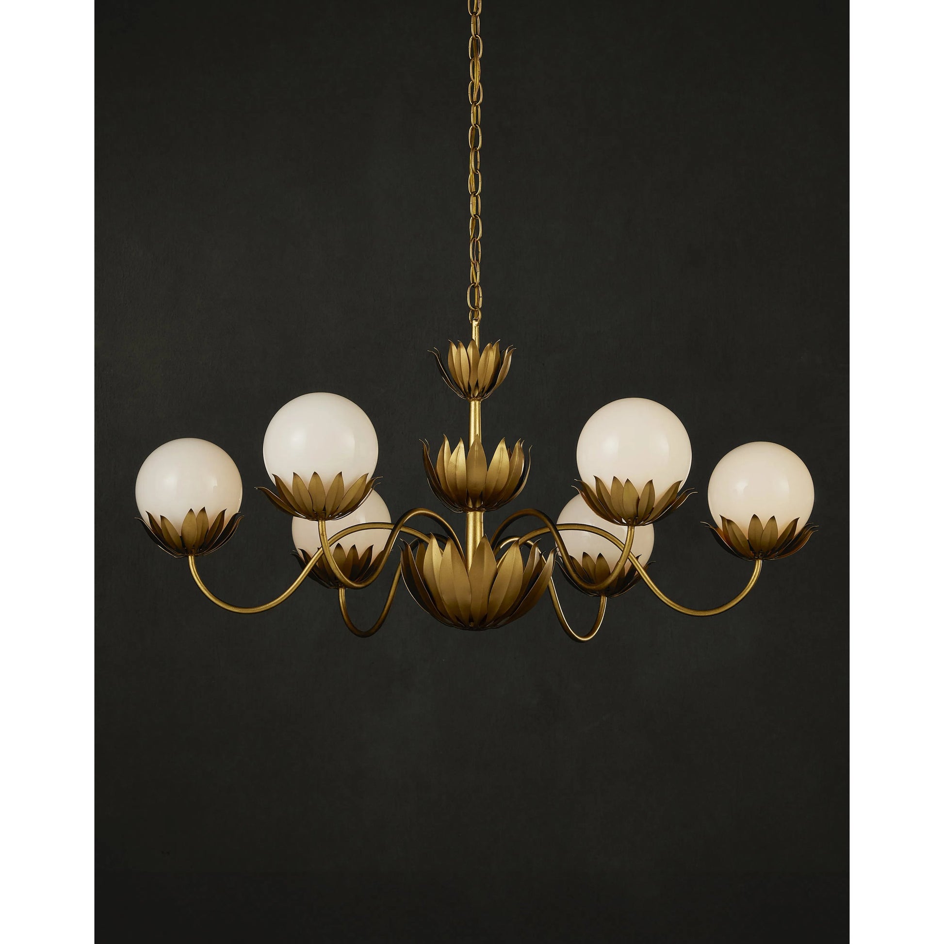 Mirasole Chandelier by Currey and Company in contemporary gold leaf, gold, white. Made from wrought iron, glass in a traditional style.
