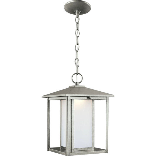 Hunnington LED Outdoor Pendant by Visual Comfort & Co. in weathered pewter. Made from aluminum in a cottage & farmhouse style.