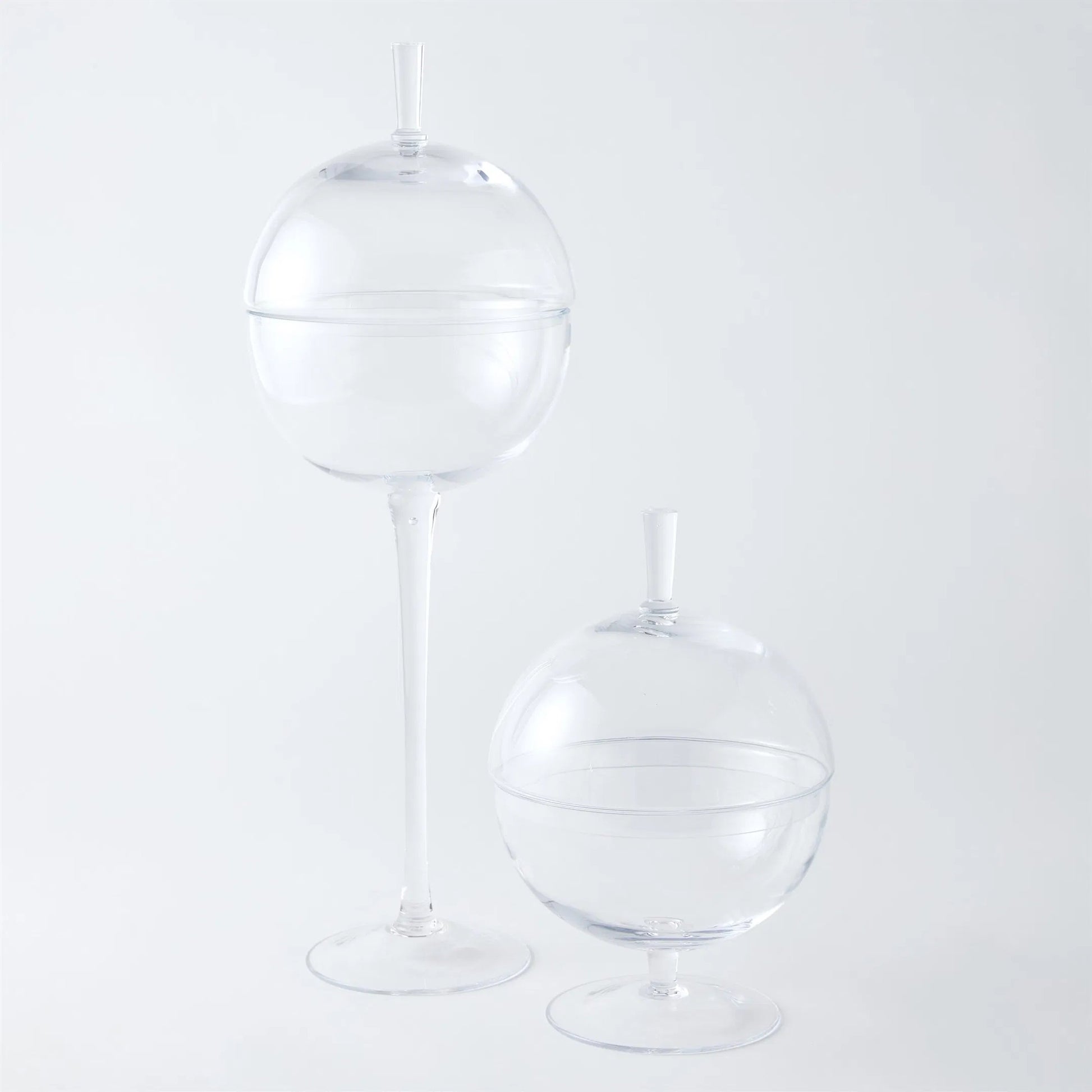 Having A Ball Covered Bowl by Global Views. Made from glass in a transitional style.