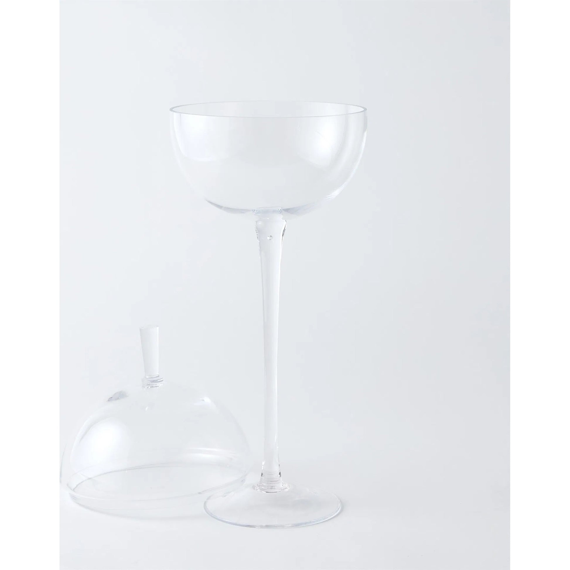 Having A Ball Covered Bowl by Global Views. Made from glass in a transitional style.