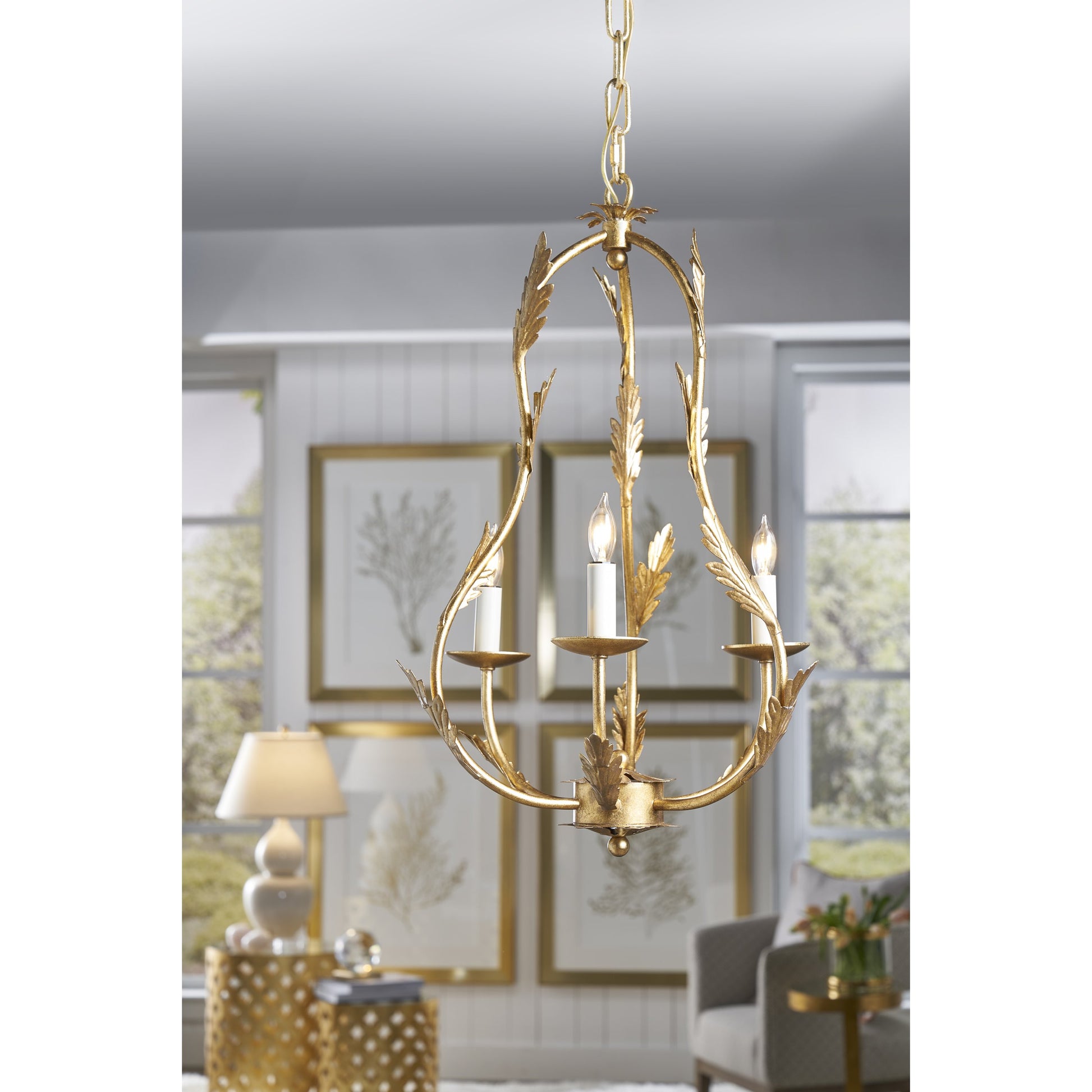 Petite Chandelier by Chelsea House in antique gold leaf. Made from other: metal in a transitional style.