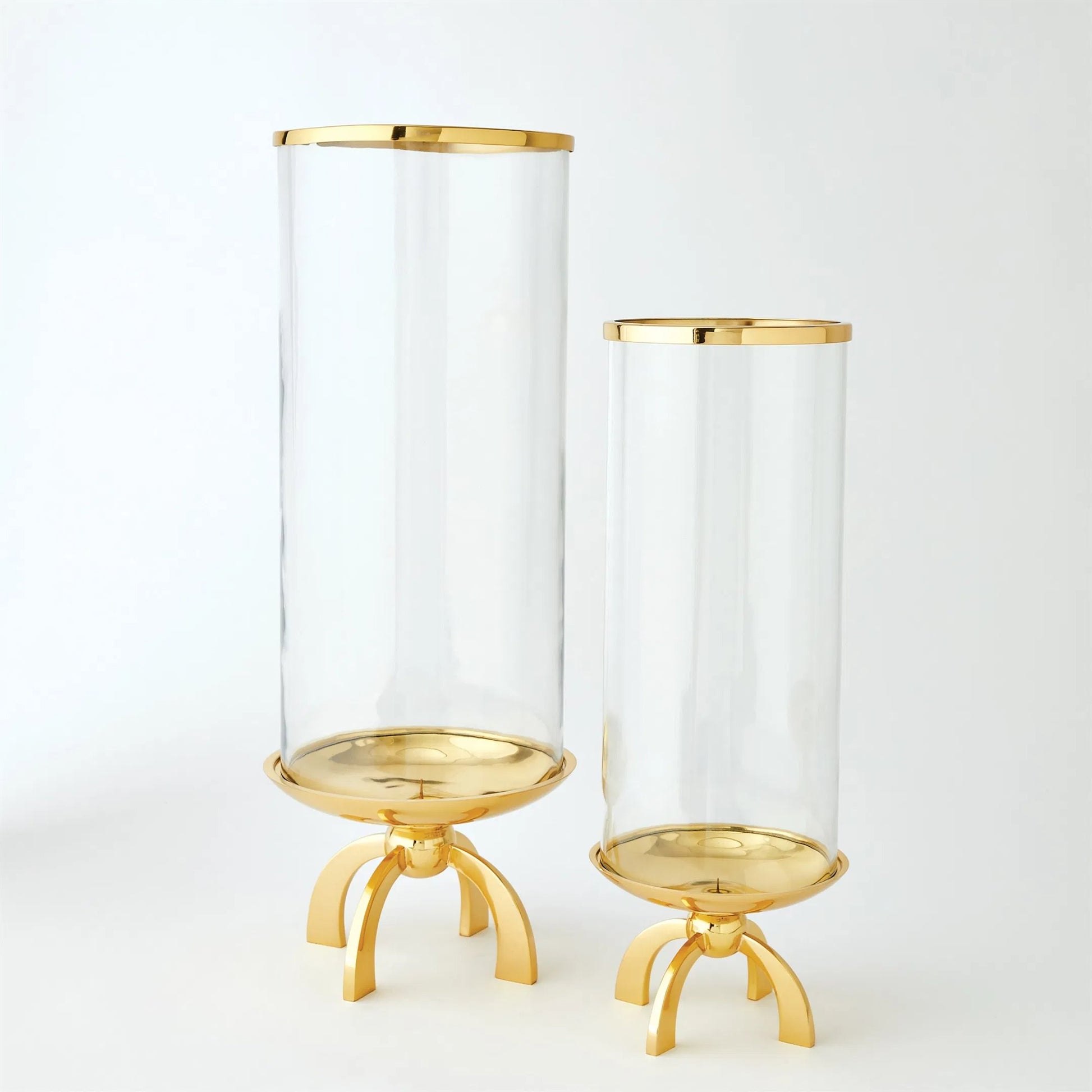 Quad Base Hurricane by Global Views in brass. Made from brass, glass in a transitional style.