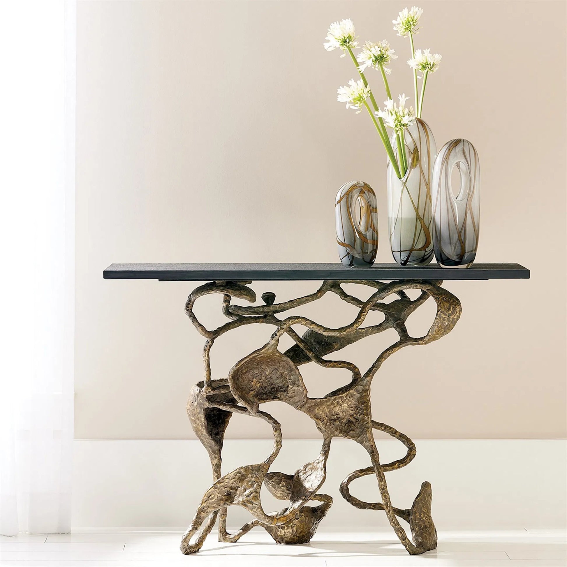 Swirl Vase by Global Views in amber, gray. Made from art glass in a modern style.