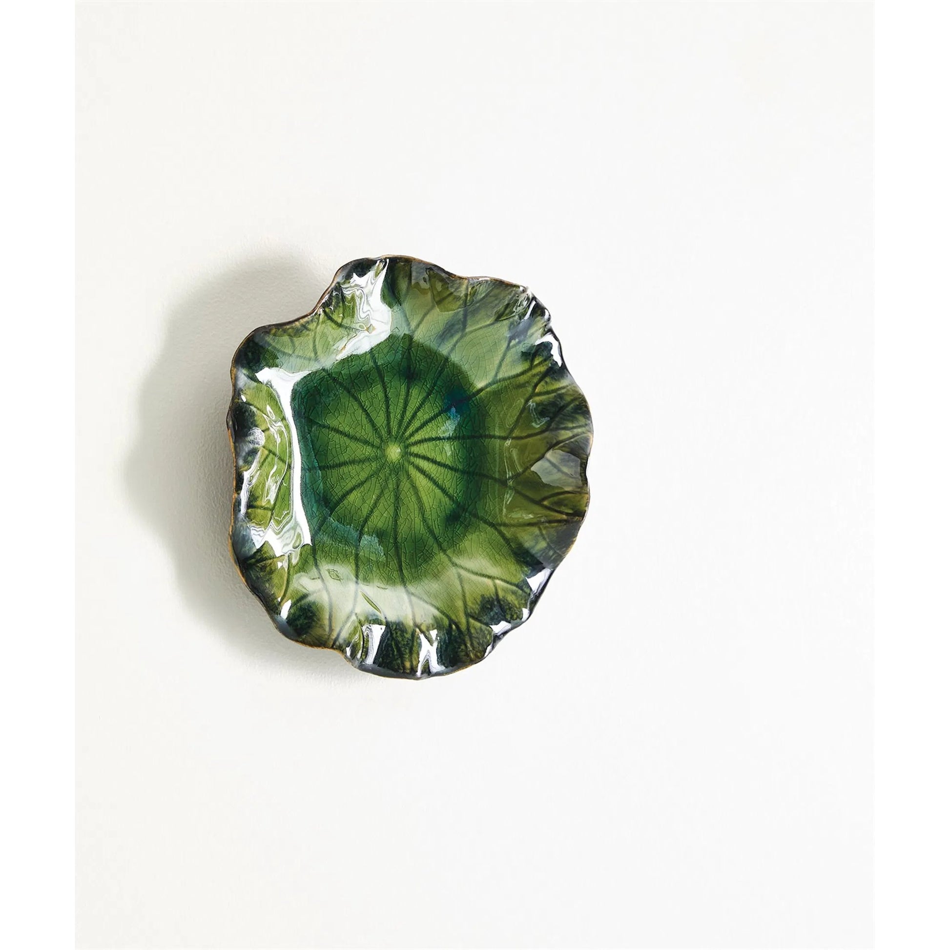 Free for Lily Plate by Global Views. Made from ceramic in a coastal style.