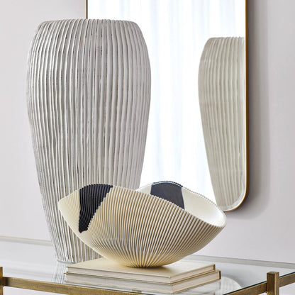 Baleen Cachepot by Global Views in ivory. Made from ceramic in a coastal style.