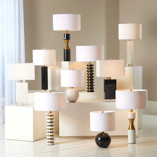 Alabaster Cylinder Table Lamp by Global Views in brass. Made from crystal, metal, alabaster in a coastal style.
